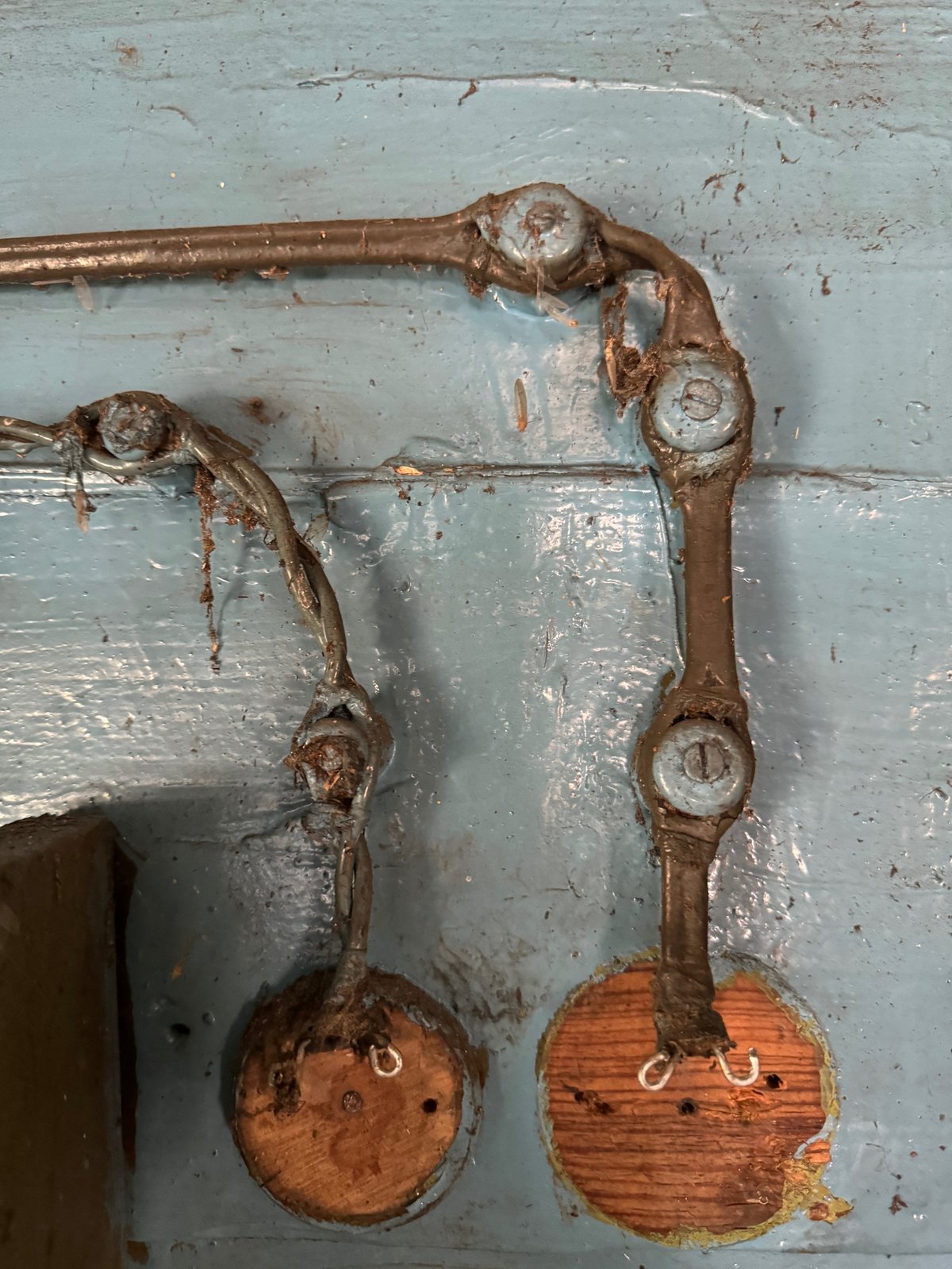 Remnants of outdated electrical wiring in abandoned rural house — CN Electrical knob-and-tube inspection and removal in Chilliwack, BC
