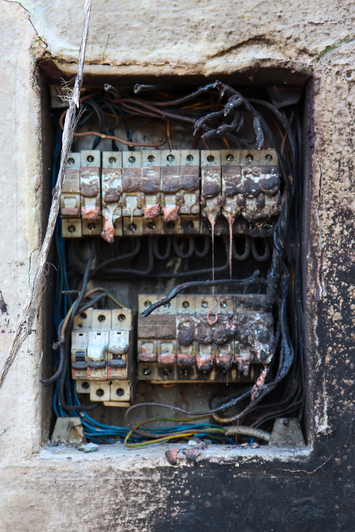 Melted fuse panel after electrical fire — CN Electrical recalled panel replacement in Chilliwack, BC